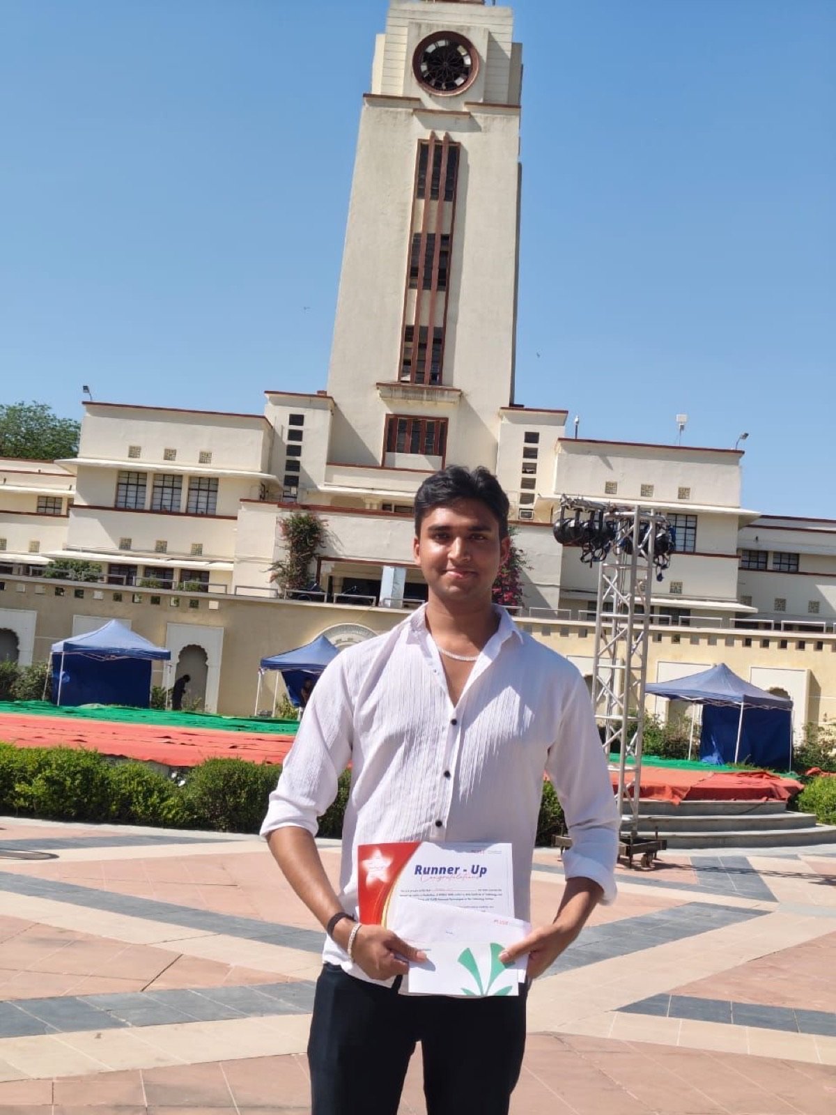 Chirag Jain outside the BITS Pilani clock tower during the hackathon