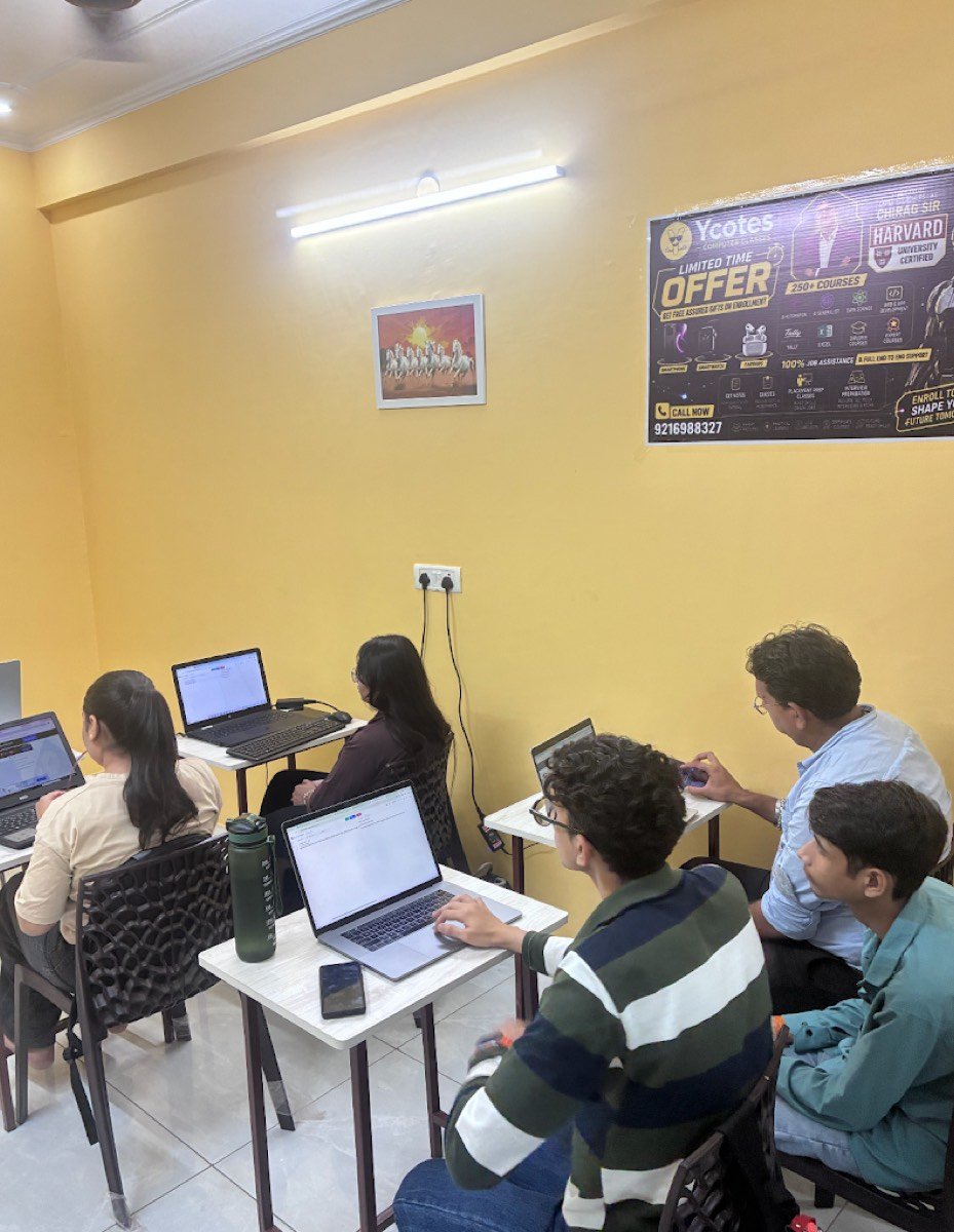 Students working at laptops in the Ycotes training room in Jaipur